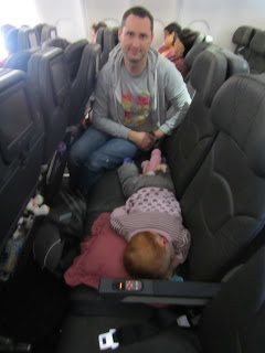 Toddler asleep in jetstar flight