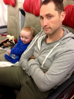 baby sitting on an air asia x flight melbourne to KL