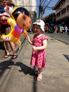 S with her prized Dora balloon in Manila