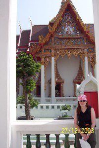 Standing in front of a temple in Bangkok on gem scam tour