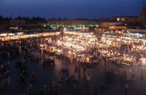 Dark main square in marrakesh with lit up food stalls