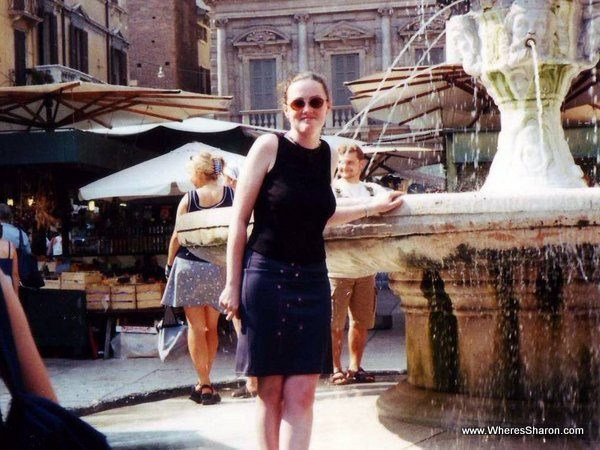 standing by fountain in verona