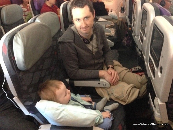baby sleeping on a plane