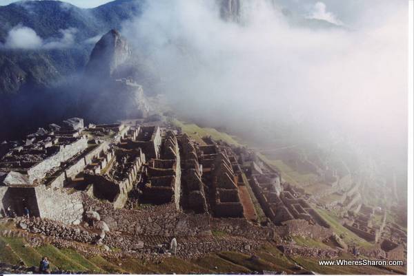 Macchu Picchu covered with some fog peru