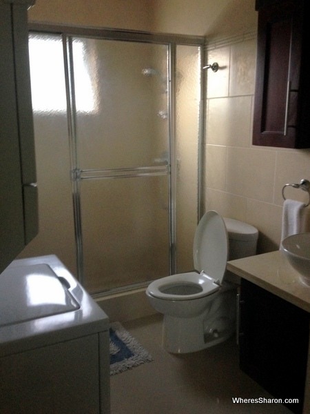 bathroom with washing machine and dryer cabarete