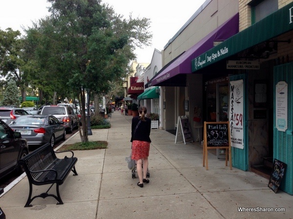 walking with a pram on the main street in winter park orlando