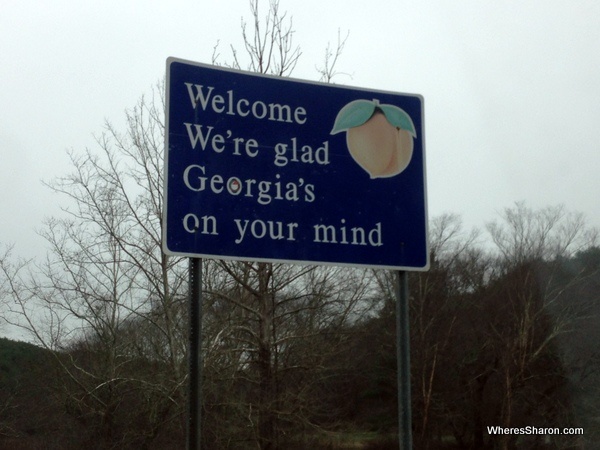 sign saying welcome to Georgia driving New Orleans to Atlanta