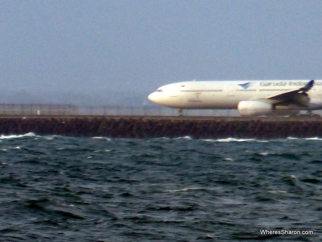 Watching a plane take from Jimbaran