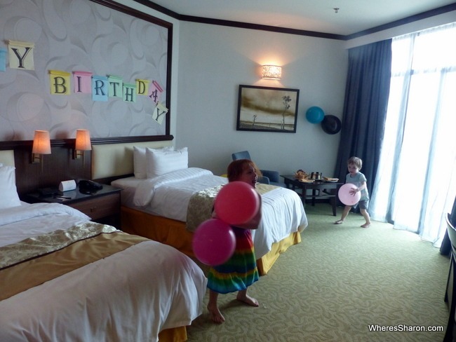 Our best welcome at a hotel ever - cake, balloons and a sign waiting in our room for Z's birthday