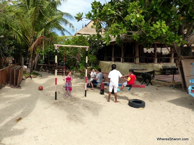 The kids enjoying the kids club's play equipment. 