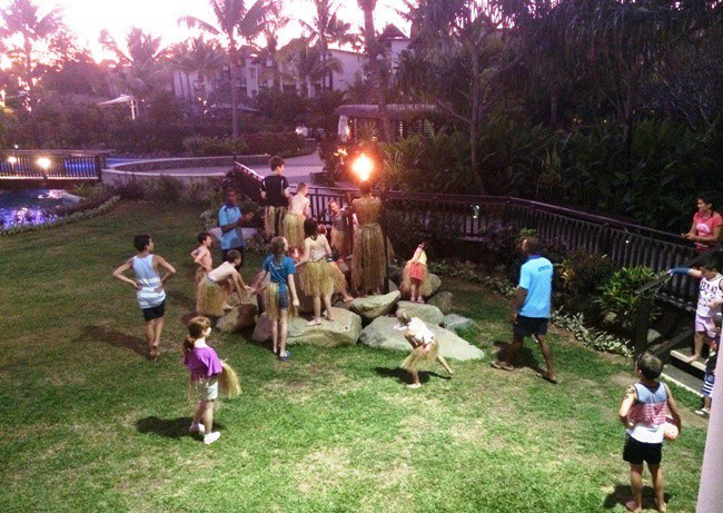 best island in fiji for families Kids Club at Radisson Blu Resort joining in the torch lighting ceremony
