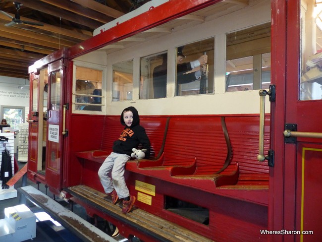 Z riding an old cable car at the Cable Car Museum, one of the many great free activities in Wellington.