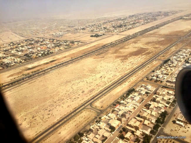 Abu Dhabi surrounded by desert